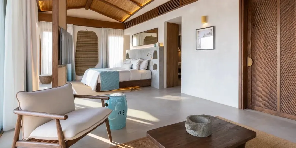 villa met bed en woonkamer